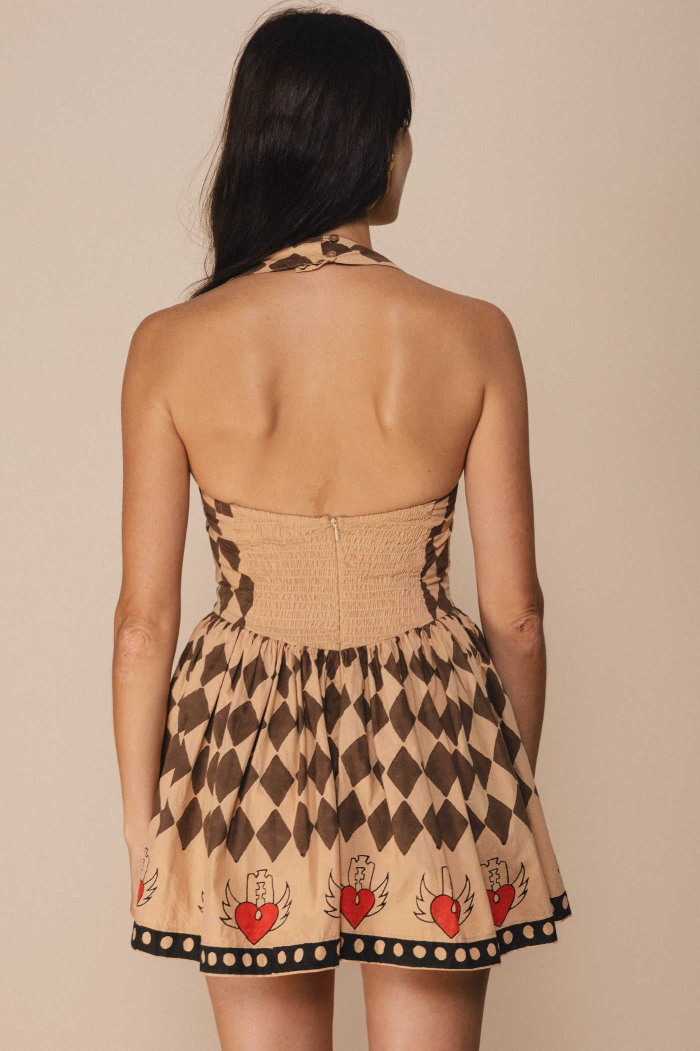 Love hurts halter mini dress